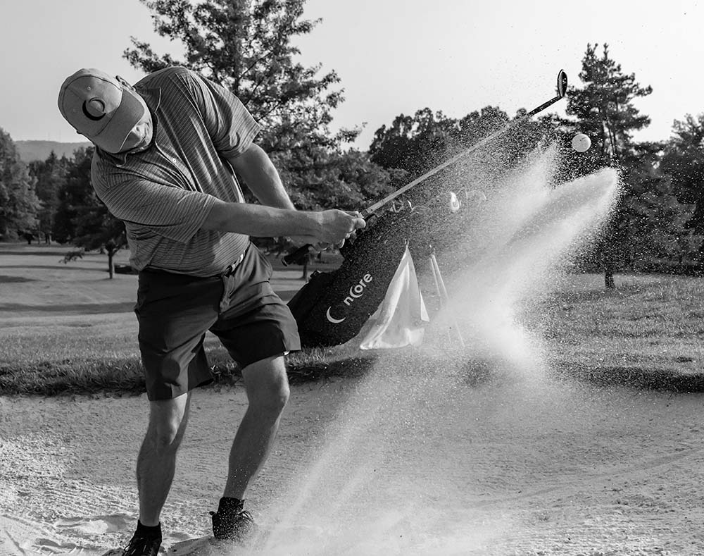 When hitting out of a greenside bunker, how would your technique change for longer vs. shorter shots? More swing? Different clubs?