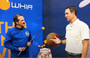 Erick Arbe with Backswing.com demos the Orange Whip with the founder, Jim Hackenberg