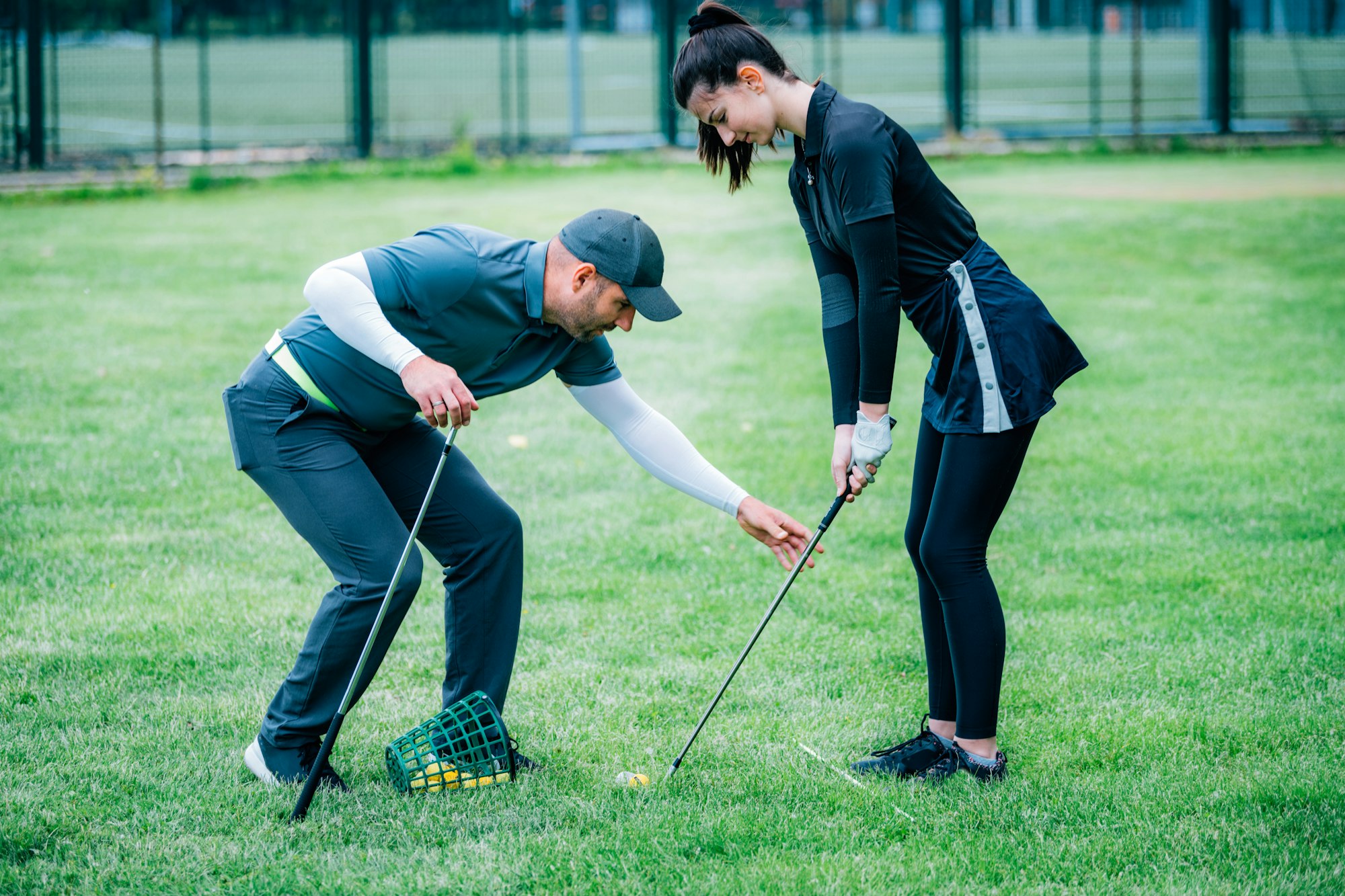 What adjustments can you make to correct scooping or flipping at impact and achieve a proper release?